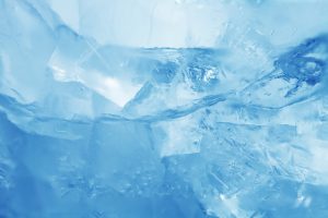 beautiful blue cracked ice. texture of frozen water. blue cracked ice. texture of frozen water.